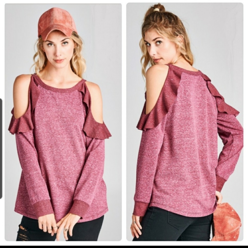 Slightly darker in person cold shoulder wom. Top